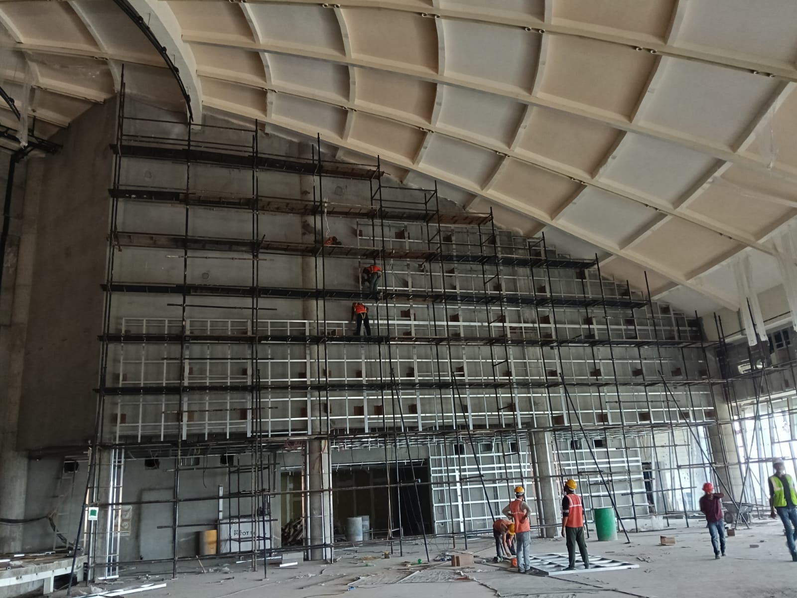 Full-height concealed metal framework under construction for a commercial interior